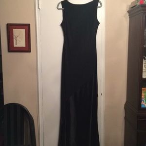Black crepe/satin classic gown.  Draped back.